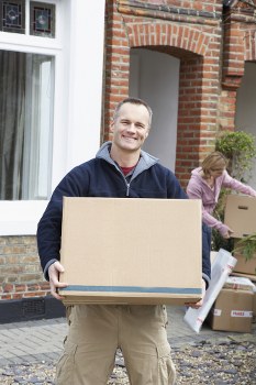 Professional house removals in Woodsidepark with moving van and packed boxes