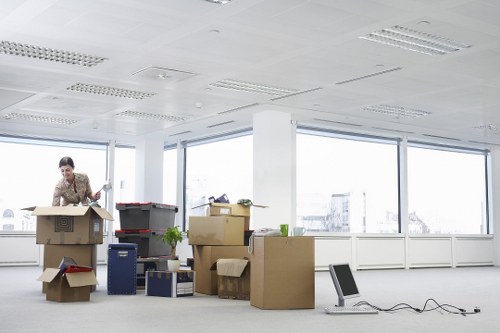 Commercial packing services in Woodsidepark preparing office supplies for transport